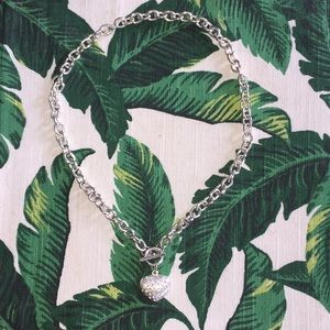 Silver heart necklace.